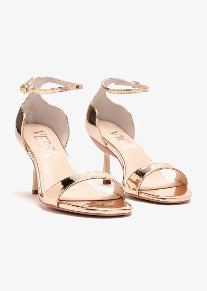 rose gold, metallic sandals with a convertible or retractable heel mechanism